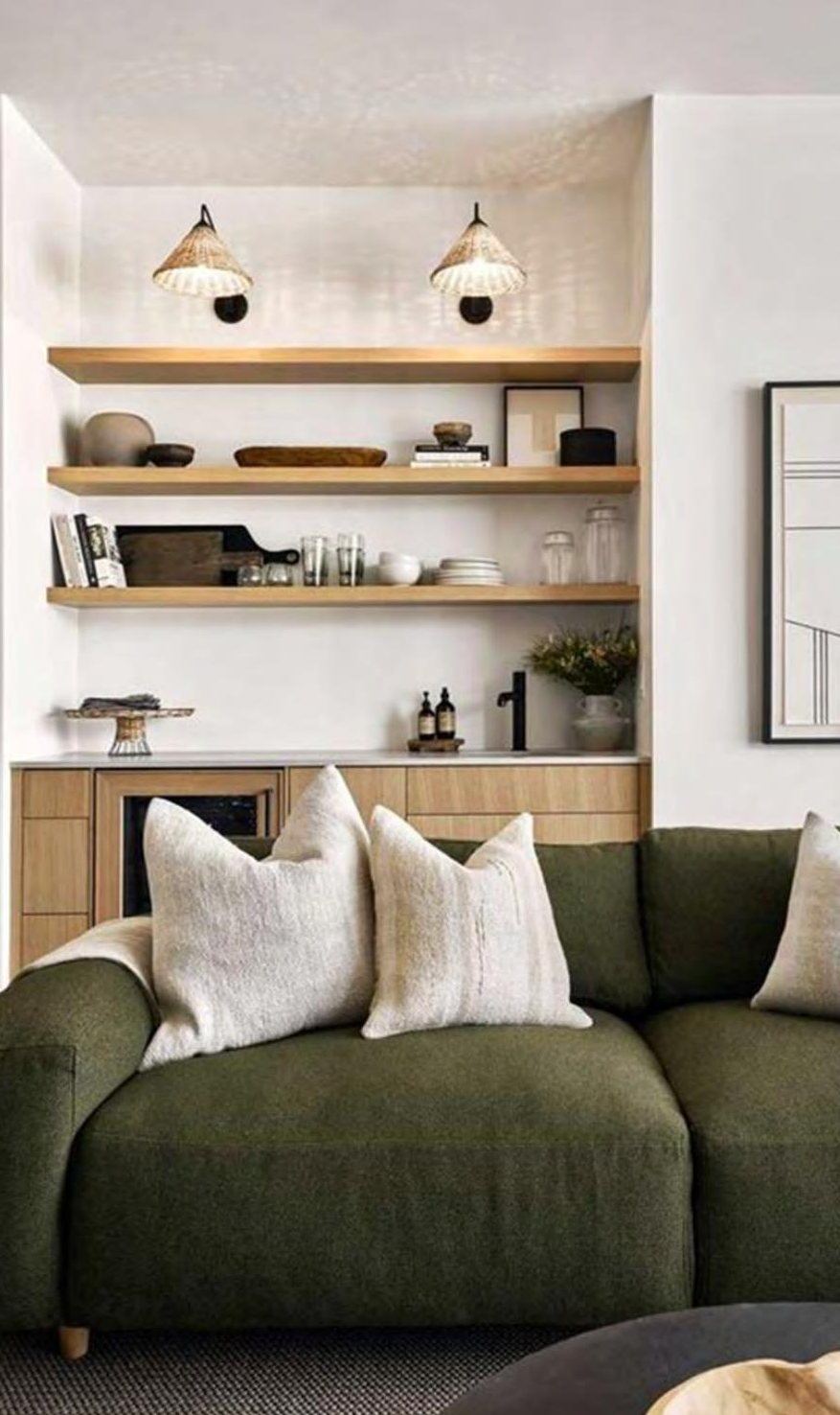 Game room: oak shelving, green velvet